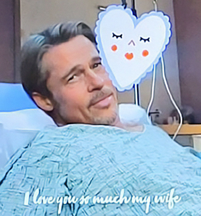 Man resembling Brad Pitt in hospital bed with a heart emoji and affectionate message at the bottom.