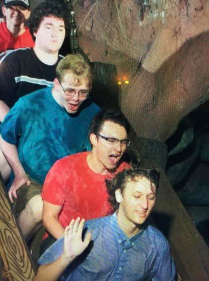 Four people on a log ride with funny expressions, perfect example of funny-camera-roll-finds.