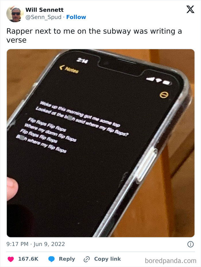 Phone screen with rap lyrics held by a passenger on a subway, capturing a funny subway moment.