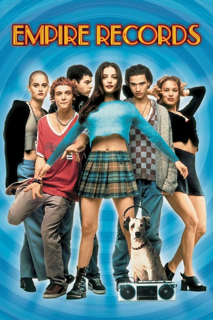 Group of young people in 90s style clothing from a classic nostalgia movie, with a dog and boombox.