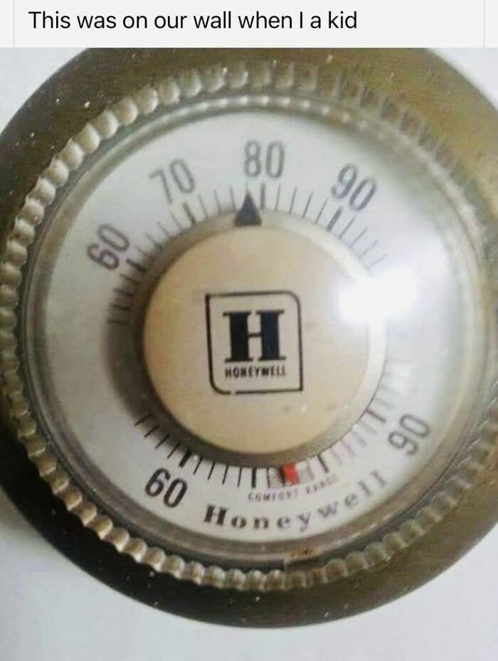 Retro Honeywell thermostat; Gen X nostalgia with temperature dial and beige color, reminiscent of childhood memories.