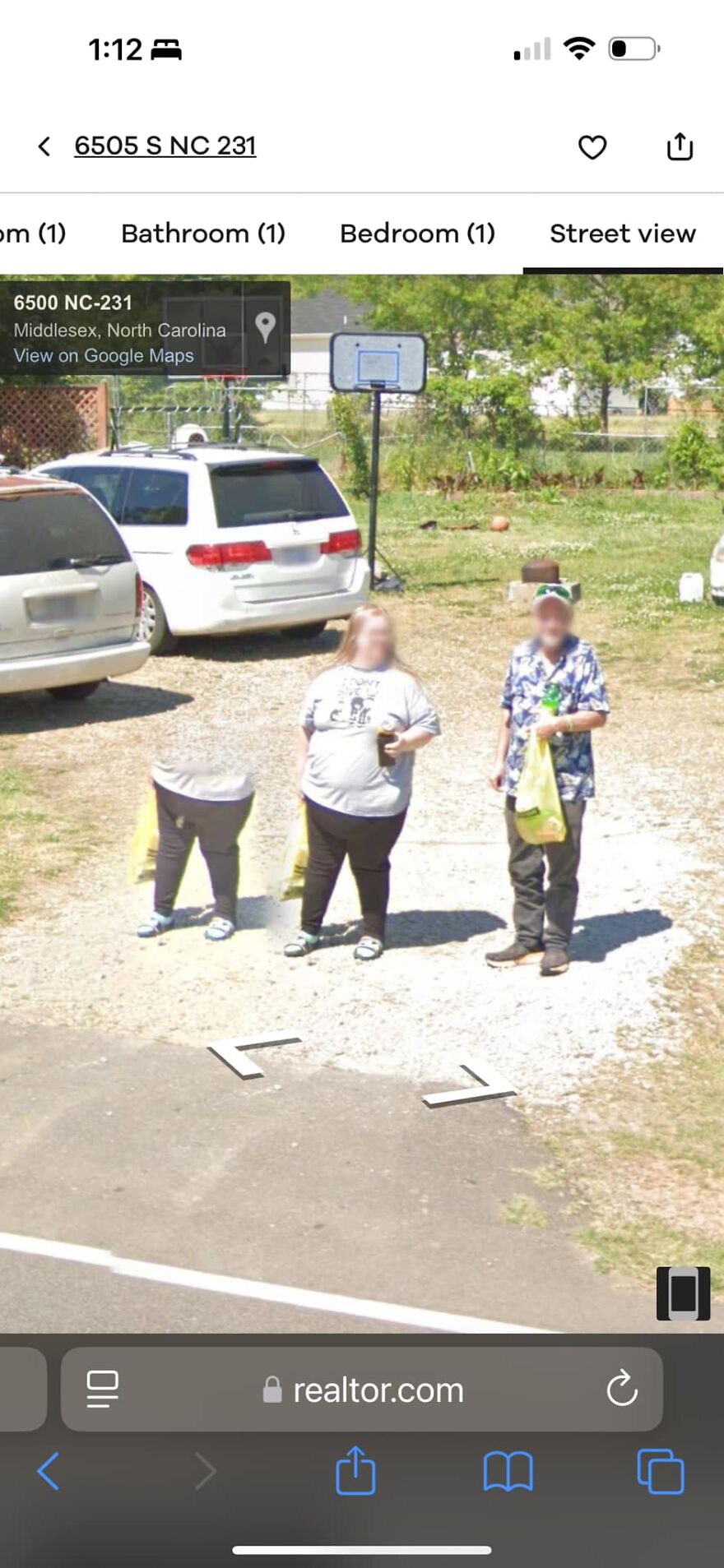 Strange sight on Google Earth with people and a surreal scene near a white van.