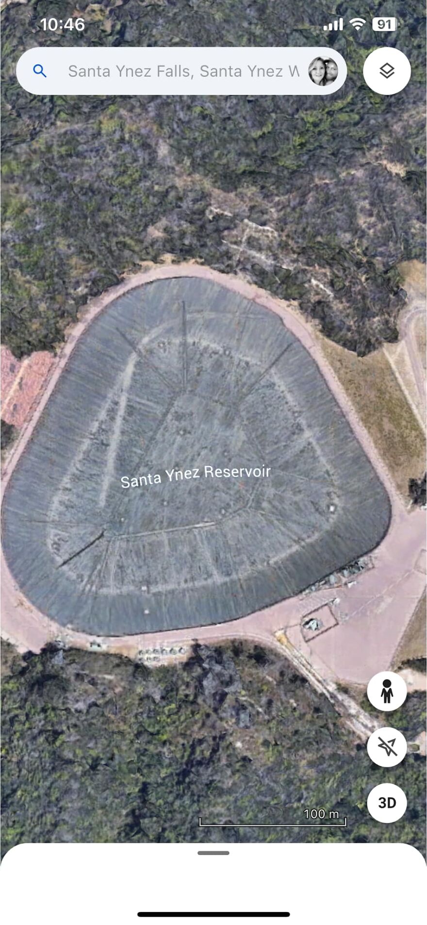 Google Earth image of Santa Ynez Reservoir's unique triangular shape surrounded by greenery.