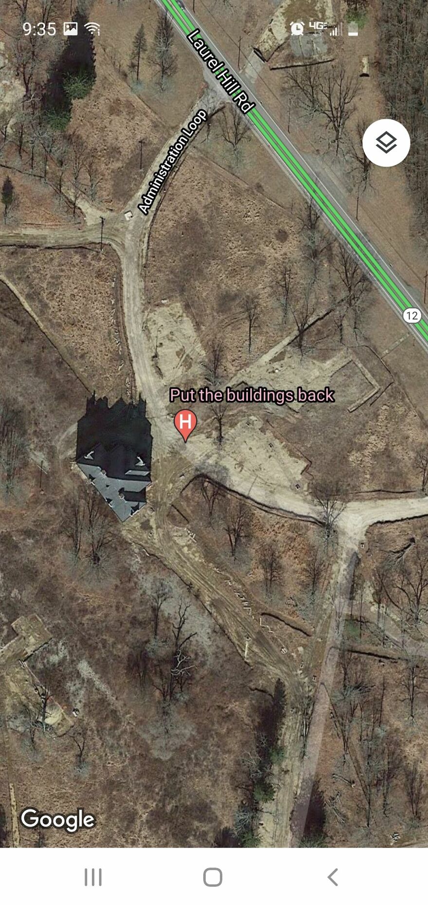 A strange discovery on Google Earth: a location marked "Put the buildings back" near Laurel Hill Rd and Administration Loop.