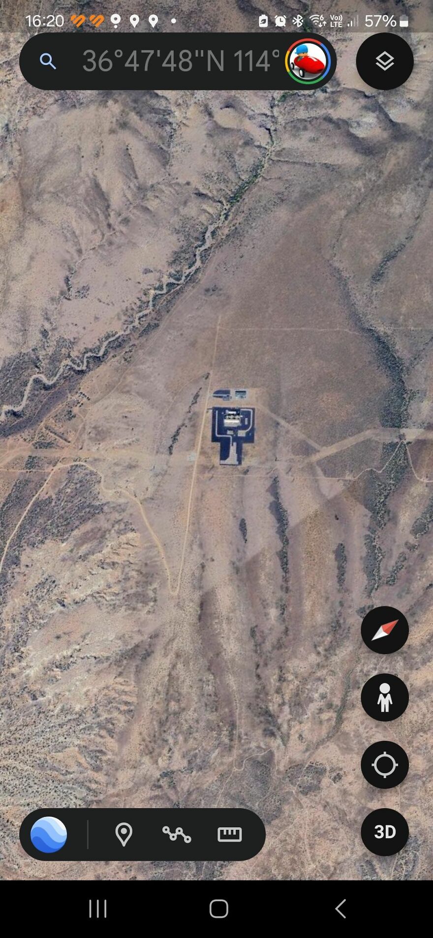 Strange Google Earth find showing a desert landscape with a geometric structure near 36°47'48"N 114° coordinates.