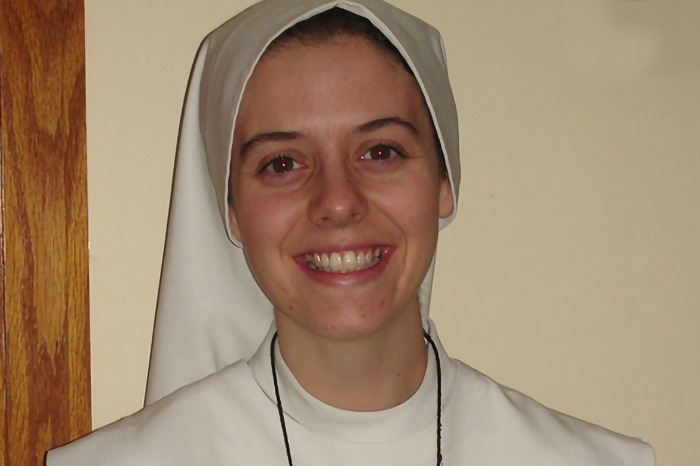 Nun smiling warmly in a habit, associated with "Wild Child" actress's journey from fame to sainthood.