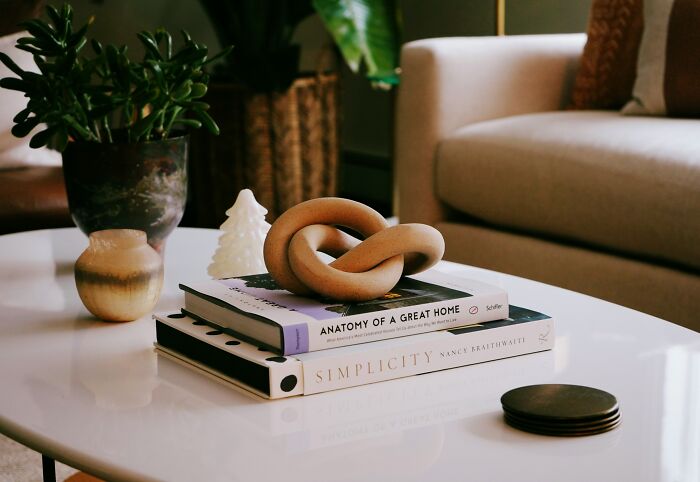 Books and decor on a coffee table.