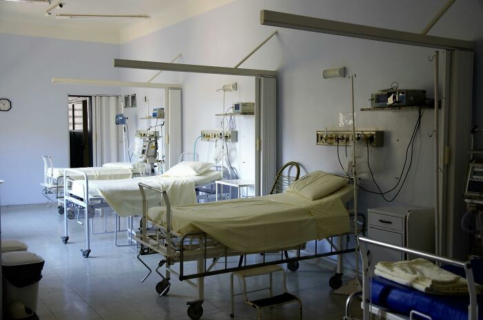 Hospital room with empty beds, related to UnitedHealth financial impact.