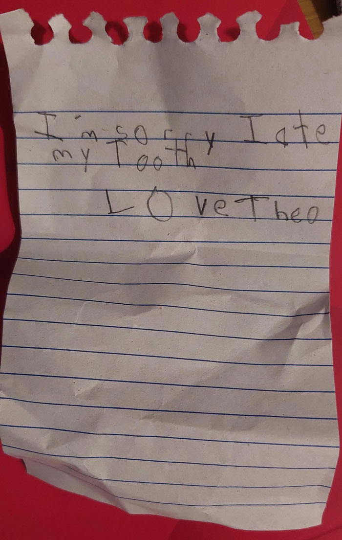 A child's funny note apologizing for eating their tooth.