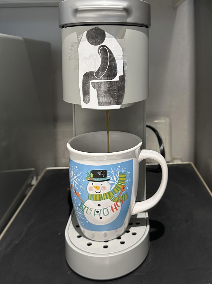 Coffee maker with humorous stick figure and snowman mug, showcasing Hilarious-Kids theme.