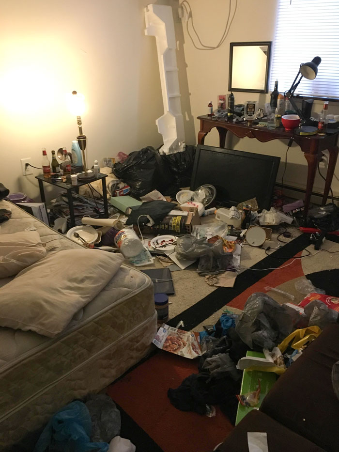 Messy room filled with trash and clutter, highlighting issues with horrible roommates.