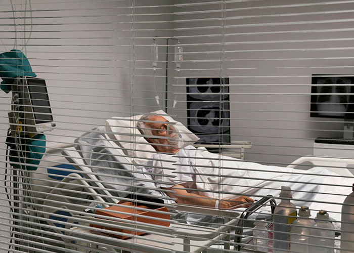 Hospital patient lying in bed, surrounded by medical equipment, illustrating normal things with a deeper horrific perspective.