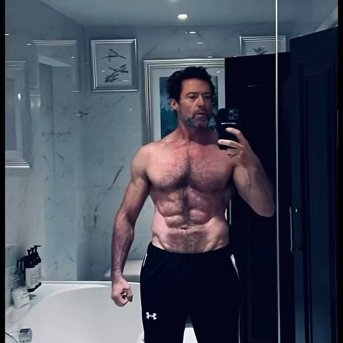 Hugh Jackman Brutally Roasted As Ricky Gervais Recreates His Shirtless Selfie