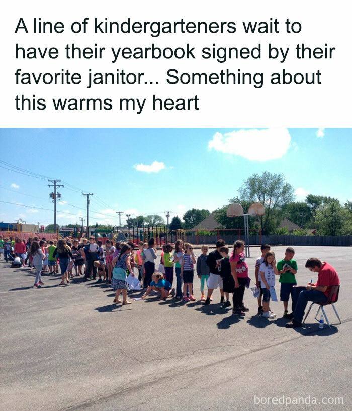 Kids lining up to get yearbooks signed by a janitor, illustrating a random yet heartwarming meme moment.