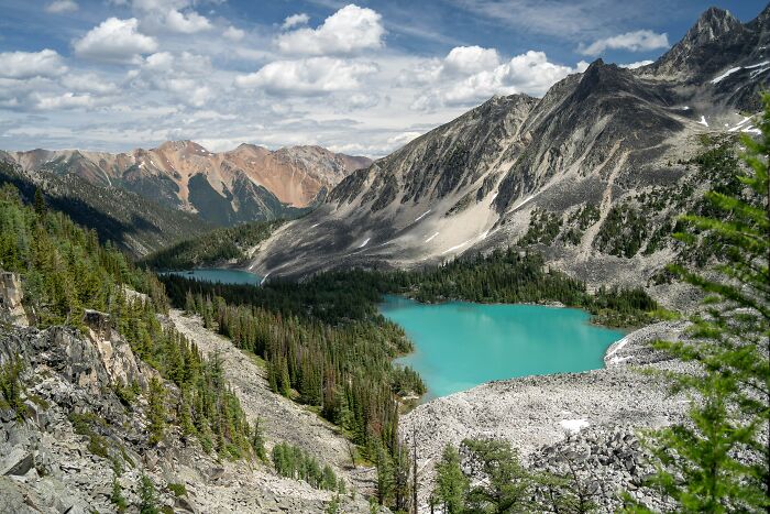 Turquoise lakes surrounded by mountains in a scenic landscape representing Tuscany Region in Italy.