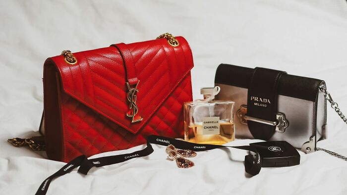 Luxury bags, perfume, and accessories, highlighting items becoming unaffordable for the middle class.