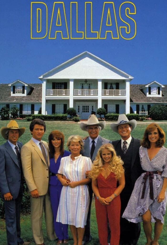 Cast of a popular TV show in front of a mansion, known for disappointing some fans with its storyline.