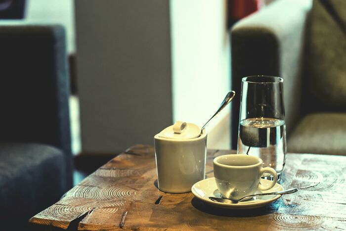 Coffee setting on a wooden table, representing things losing appeal for older adults.