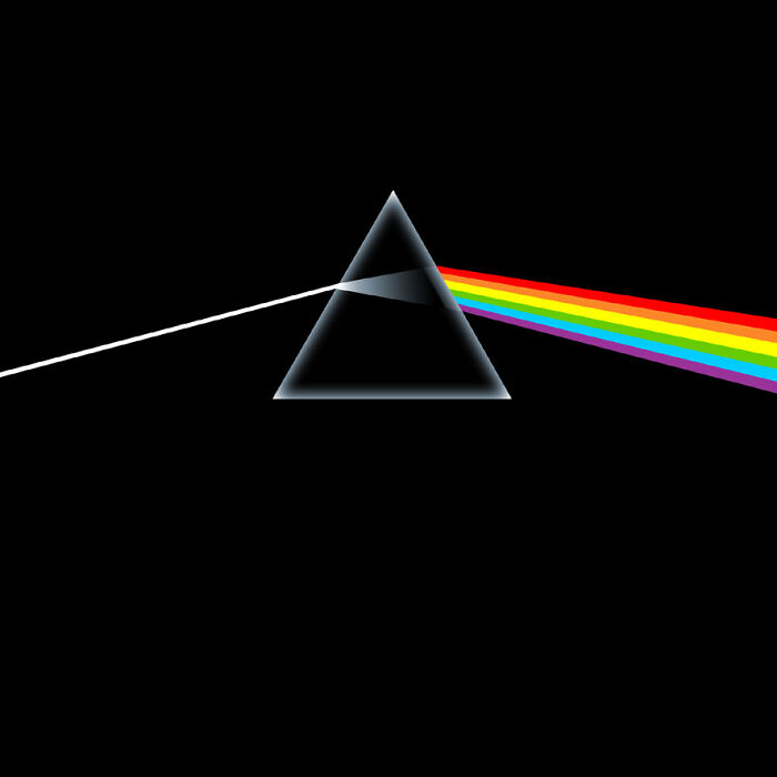 A prism refracting light into a rainbow, symbolizing iconic '70s music.