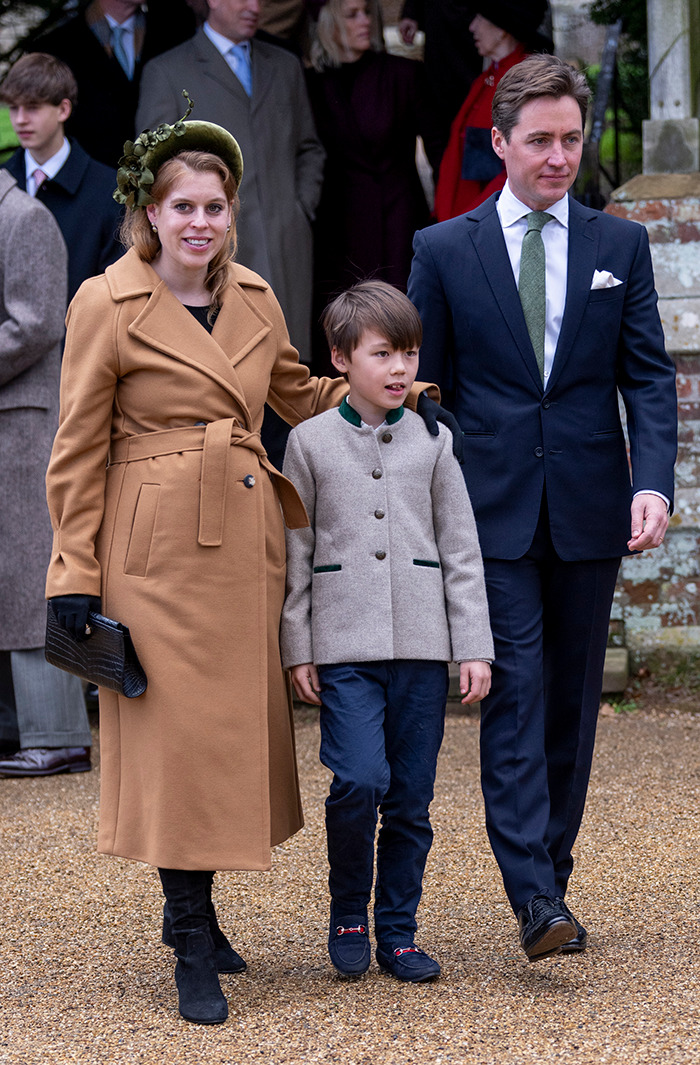 Princess Beatrice and Edoardo Mapelli Mozzi with son outdoors.