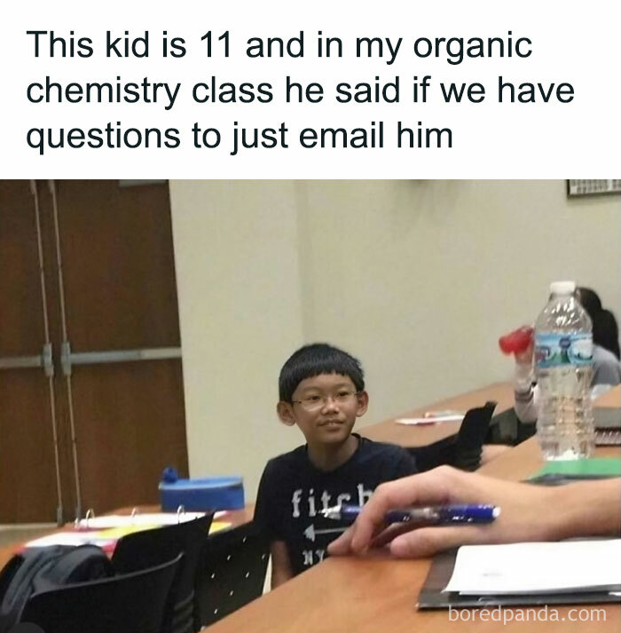 Young boy in a classroom, humorously captioned to highlight a moment of random hilarity.