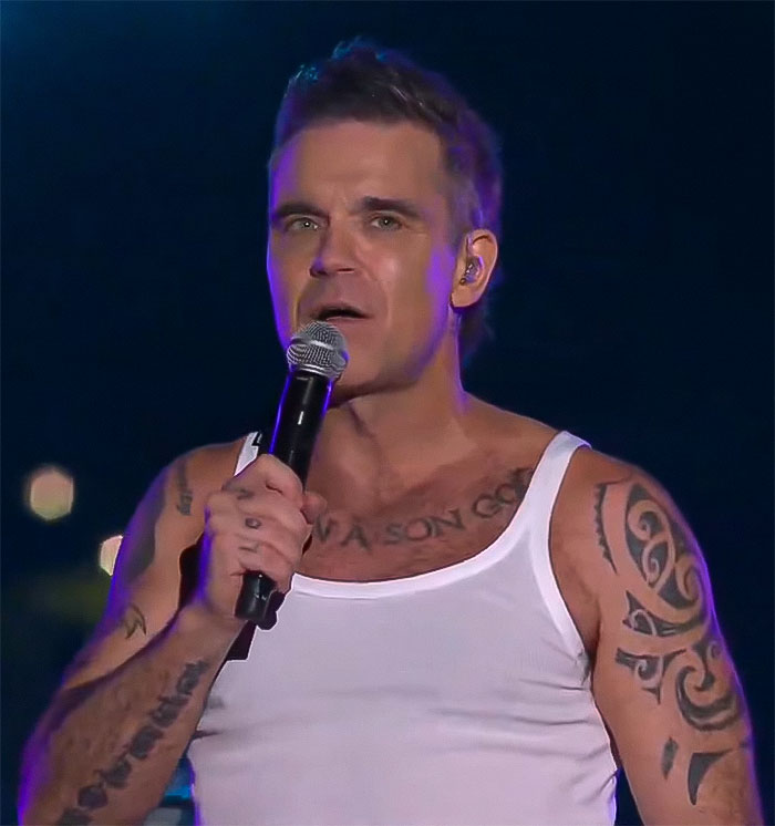 “Never Seen Anything Like That”: Robbie Williams Slammed For Blaming Fan For Mistake At NYE Gig