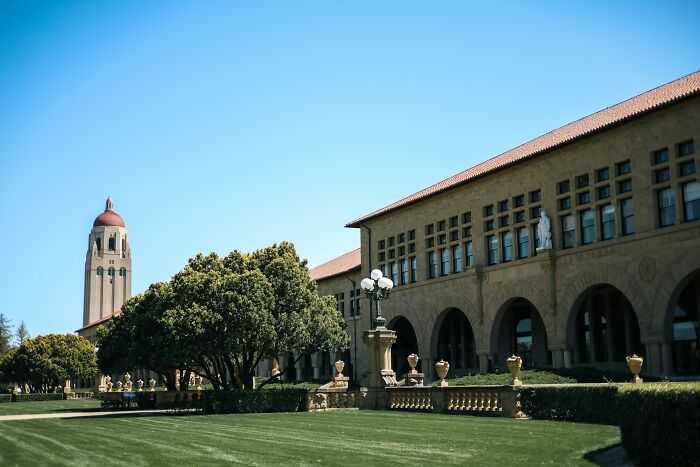 Campus view with historical architecture and greenery, showcasing intriguing facts from the "Today I Learned" community.