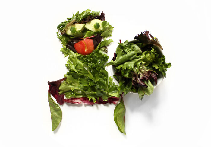 Playful food art design using fresh ingredients arranged to resemble a cartoon character.