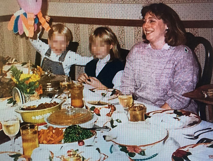 A woman and two children with pixelated faces at a table, linked to true crime cases plot twists.