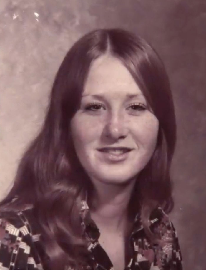 Portrait of a woman with long hair, related to true crime plot twists.