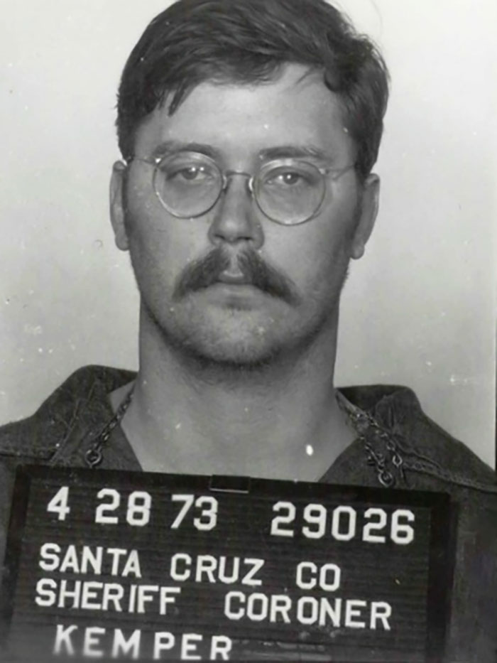 Mugshot of a man with glasses and mustache, related to true crime cases plot twists.