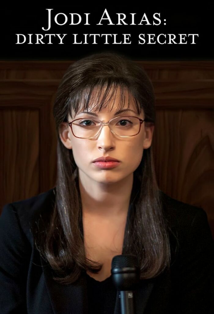 Woman with glasses in courtroom setting, representing true crime case for TV adaptation.