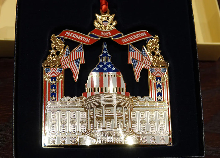 VIP goodie bag item from the Trump inauguration, featuring a patriotic themed ornament with US flags and the Capitol building.