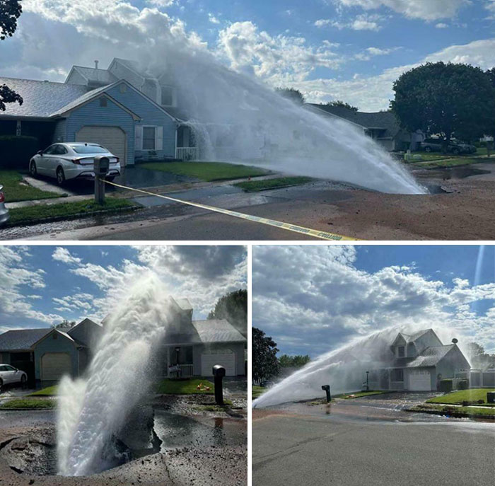 Burst water main causing street flooding near houses, illustrating an expensive incident.