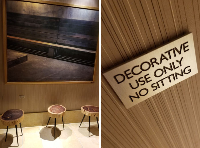 Unfortunate public interior design with decorative stools and a no-sitting sign.