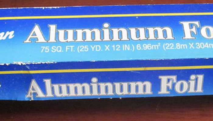 Box of aluminum foil close-up, showing packaging, related to using things in the wrong way.