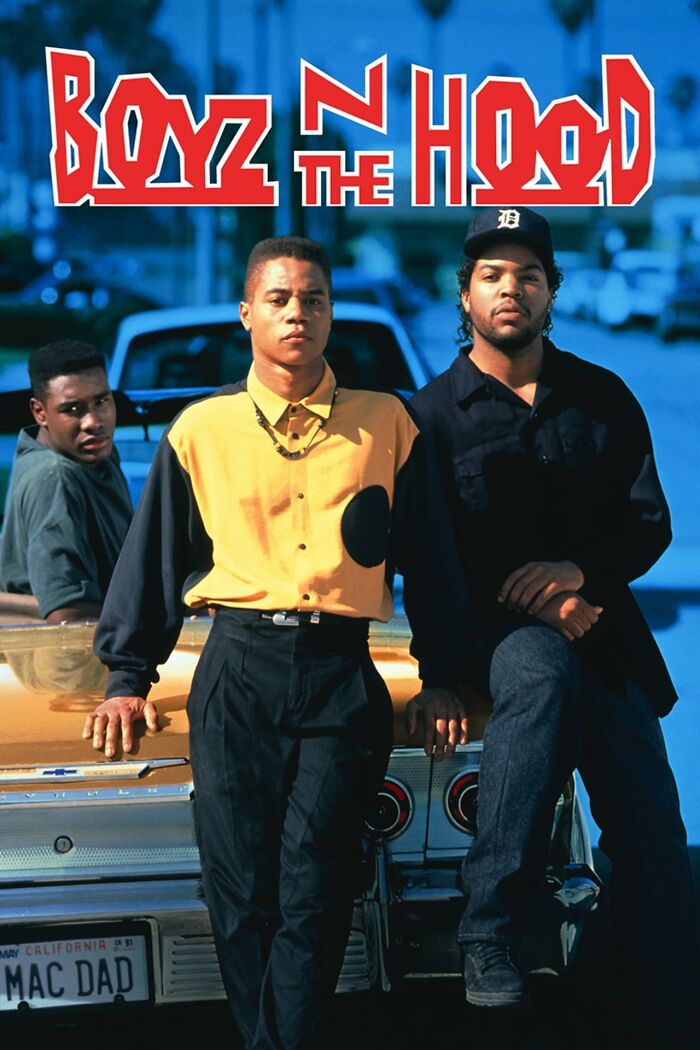 Three men leaning against a car with the "Boyz N the Hood" logo, reflecting themes of best nostalgia movies.