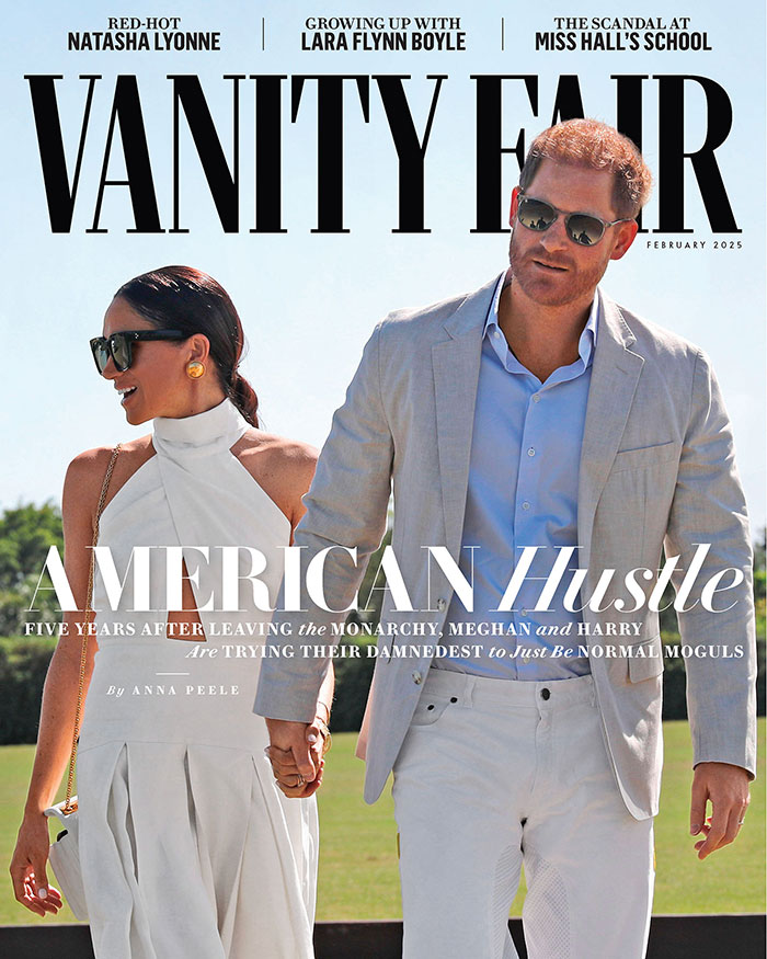 Meghan Markle and Prince Harry featured on Vanity Fair cover, holding hands in stylish attire.