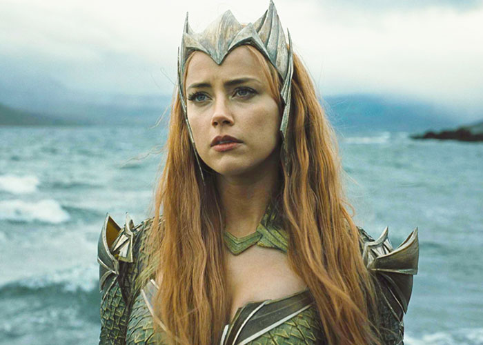 Actress in a fantasy costume by the ocean, linked to worst casting choice discussion in film history.