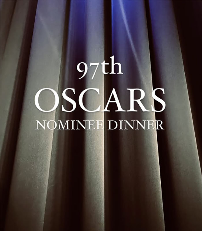 97th Oscars Nominee Dinner text on a backdrop of dark stage curtains, highlighting Oscar fashion.