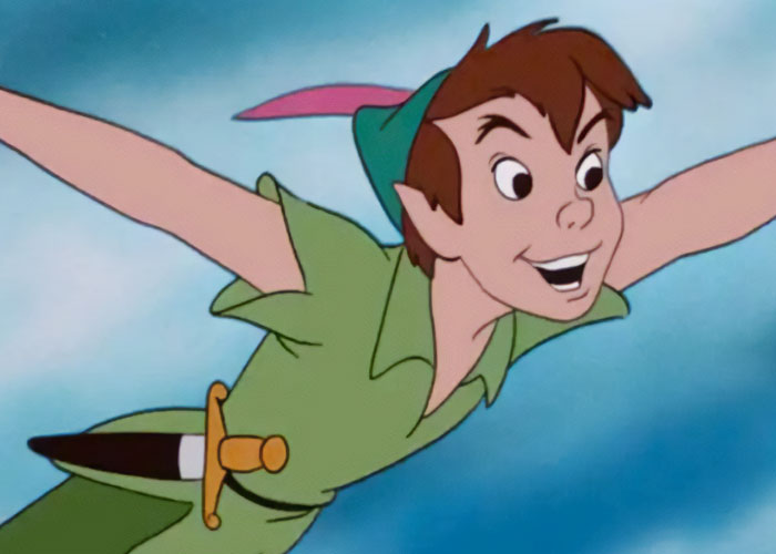 Animated character flying with a green outfit, embodying delightfully wholesome vibes.