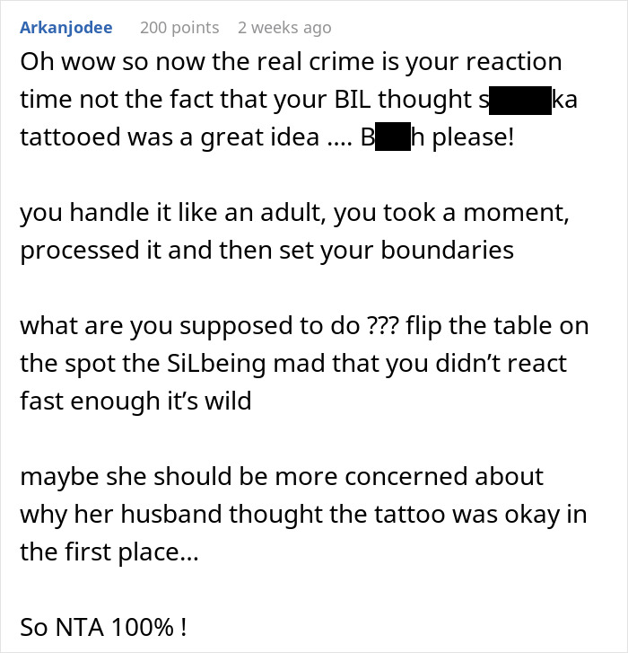 Reddit comment discussing a woman's reaction to her BIL's offensive tattoo, supporting her for setting boundaries.