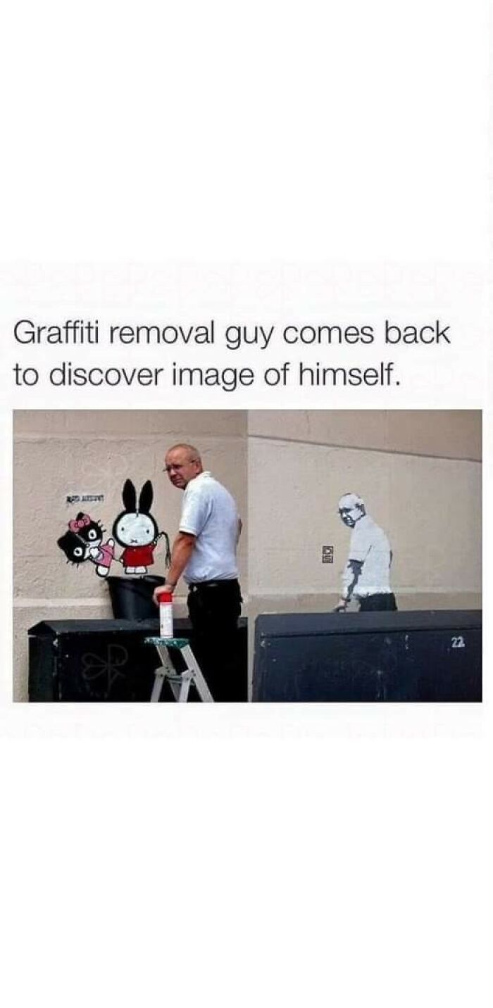 Graffiti removal worker humorously discovers his own image on a wall.