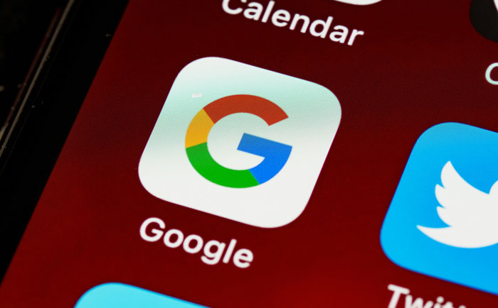 Google app icon displayed on a smartphone screen among other apps.