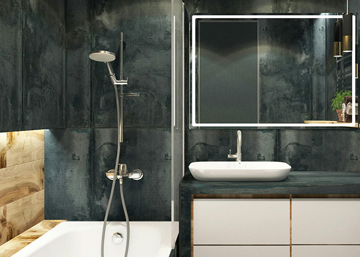 Modern European bathroom with dark stone walls, a sleek shower, and a white sink for a compact design reflecting culture shocks.