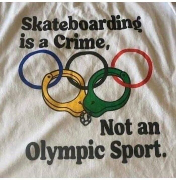 T-shirt with text "Skateboarding is a Crime, Not an Olympic Sport" over Olympic rings. Future predictions aged bad.