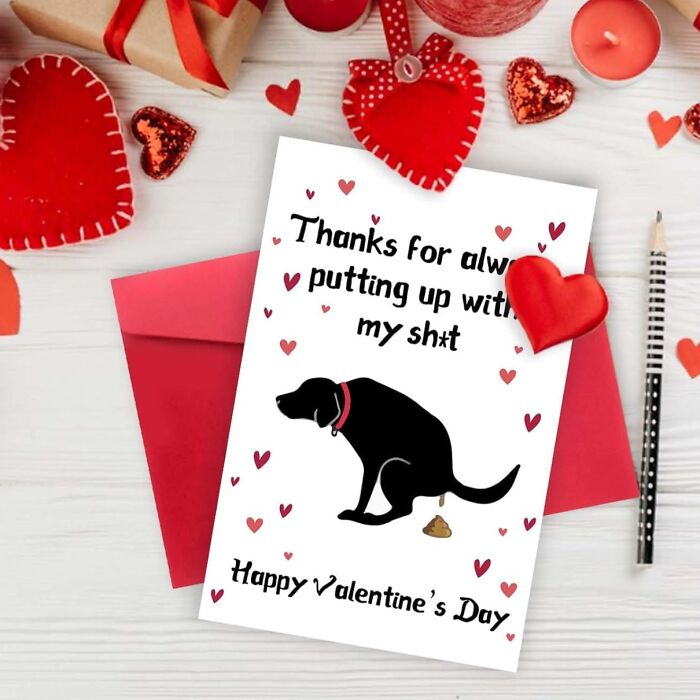 Funny Valentine's card with a dog illustration, surrounded by red hearts and gifts.