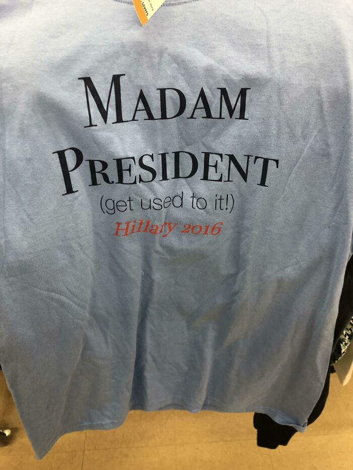 Blue shirt with "Madam President, get used to it! Hillary 2016" text highlighting future-predictions gone awry.