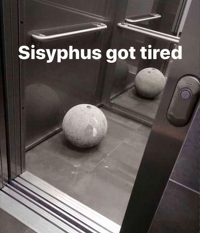 Stone sphere in an elevator, resembling a "final boss" moment, with text "Sisyphus got tired" on the wall.