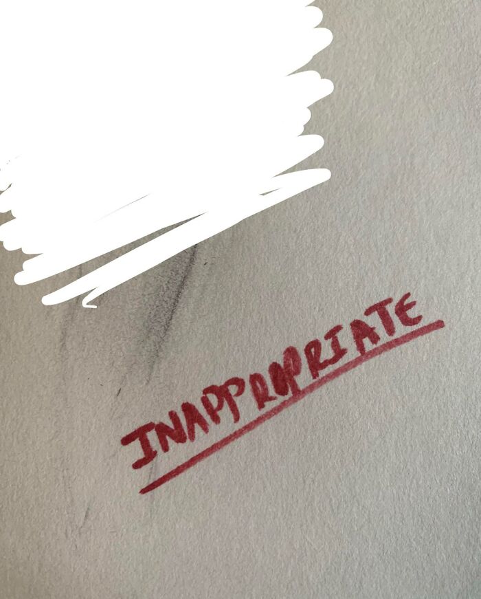 The word "inappropriate" written in red on a paper, possibly highlighting bad teachers' remarks.